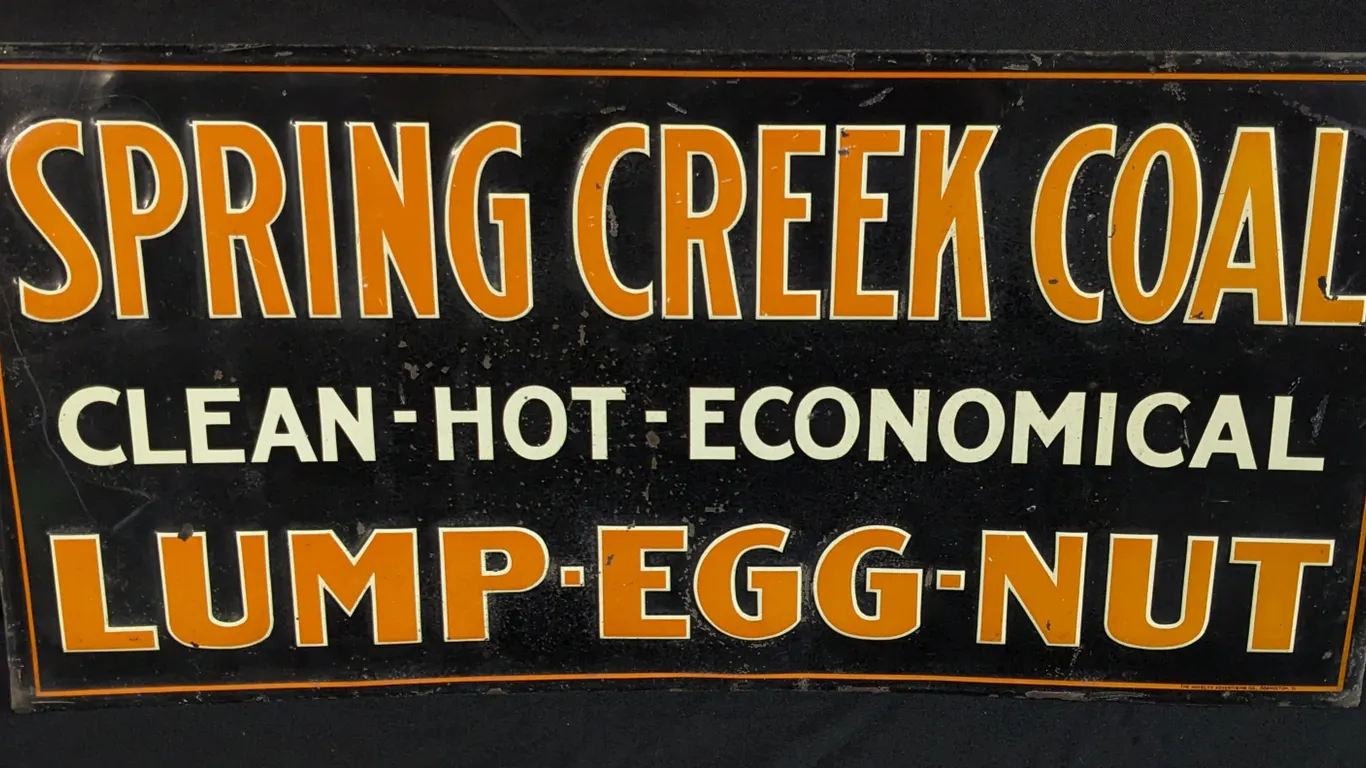 EMBOSSED TIN SIGN SPRING CREEK COAL CLEAN-HOT-ECONOMICAL LUMP-EGG-NET (DECKER, BIG HORN COUNTY MONTANA)