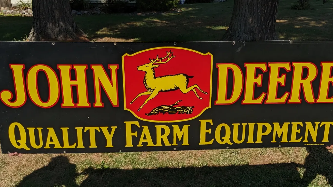 PORCELAIN SIGN JOHN DEERE QUALITY FARM EQUIPMENT (DOUBLE SIDED)