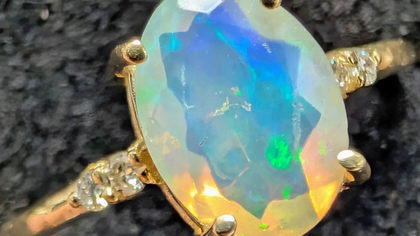 10K(1.5G), OPAL (1.5CT), DIAMOND (0.06CT)RING, SIZE 7, SUGGESTED RETAIL VALUE $2400