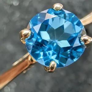 10K(1.2G), BLUE TOPAZ (0.7CT)RING, SIZE 7, SUGGESTED RETAIL VALUE $1800