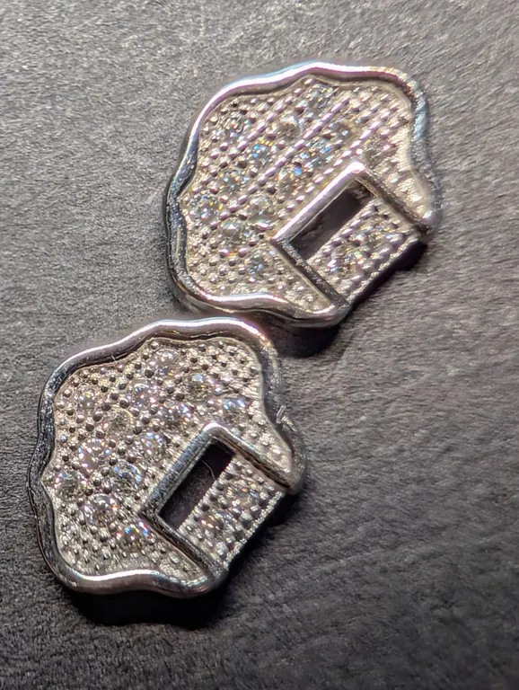 SILVER EARRINGS.