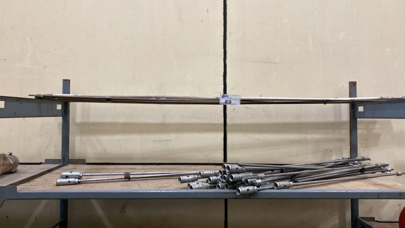SHELF OF ASSORTED CONNECTING RODS
