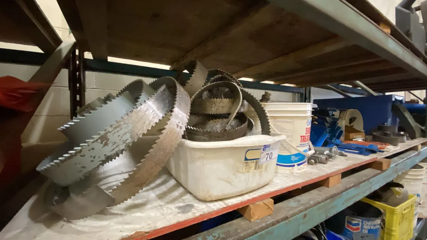 SHELF OF ROOT CUTTER ATTACHMENTS & BLADES