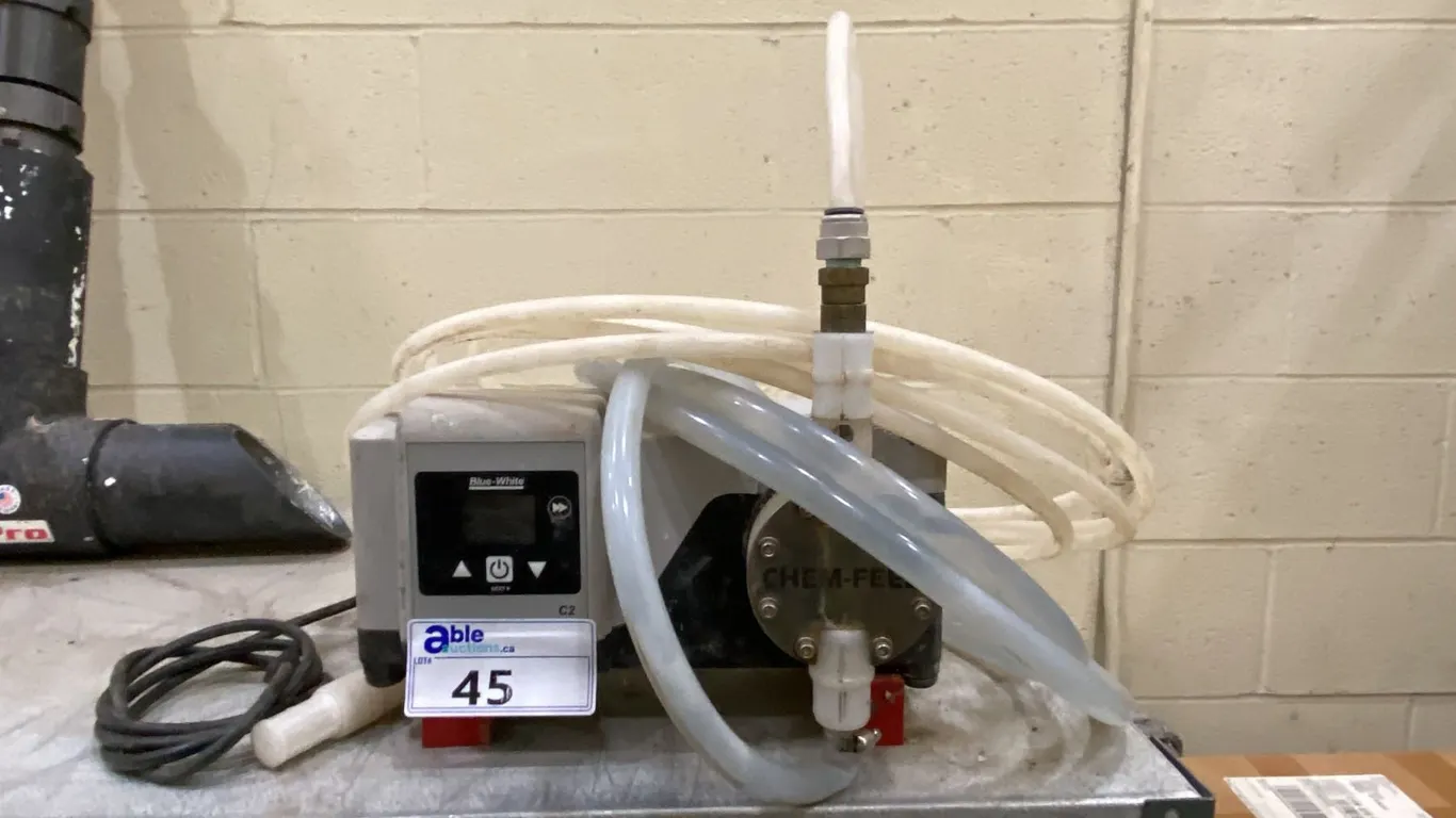 BLUE WHITE CHEM-FEED CHEMICAL DISPENSER