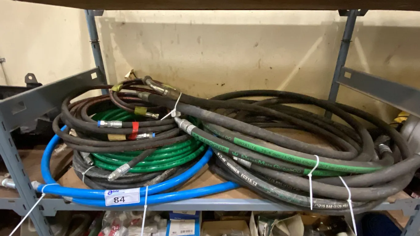 SHELF OF ASSORTED WATER LINES *SOME NEW, SOME USED*