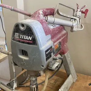 TITAN XT250 1/2 HP AIRLESS PAINT SPRAYER ON STAND