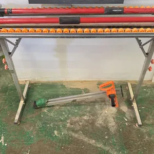SMALL LIGHT DUTY PORTABLE MATERIAL ROLLER CONVEYOR, 2 SUPPORT POLE JACKS & GYPSUM BOARD CUTTING
