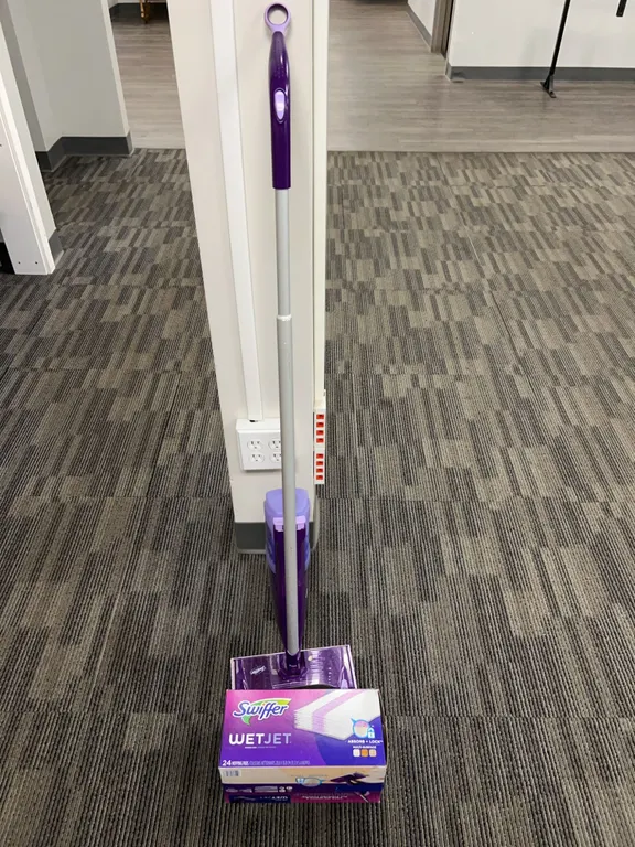 Swiffer WetJet Floor Spray Mop Starter Kit with Cleaning Solution and Multiple Refill Pads Included