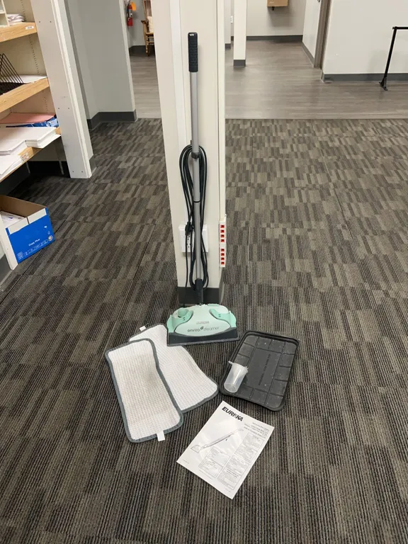 Eureka Enviro Steamer Model 313A with Owner's Manual, Cleaning Pads, Tray, and Measuring Cup Include