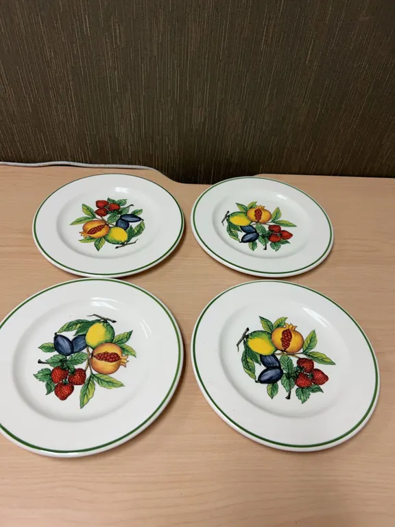 Four 8-Inch Porcelain Dessert Plates with Fruit Motif and Green Rim, Embossed Mark on Reverse