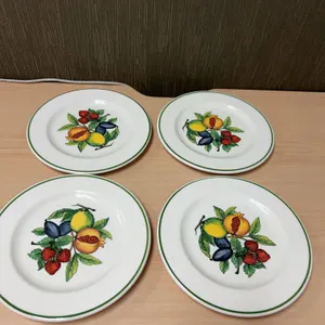 Four 8-Inch Porcelain Dessert Plates with Fruit Motif and Green Rim, Embossed Mark on Reverse