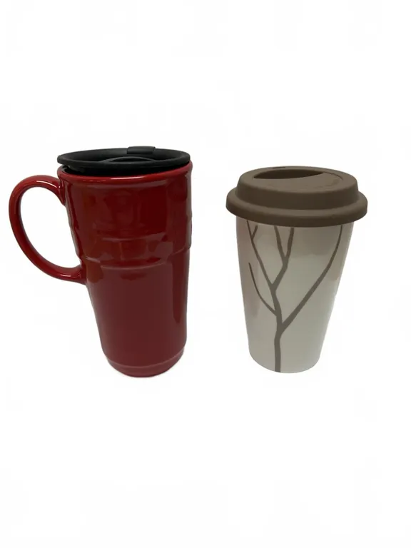 Two Pottery Travel Mugs: Longaberger Pottery Red Vitrified Mug and Lenox Park City Art Ware Mug