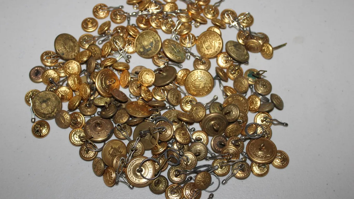 Large Assortment of South Bend College Police Uniform Buttons in Gold Tone Metal with Linked Sets an