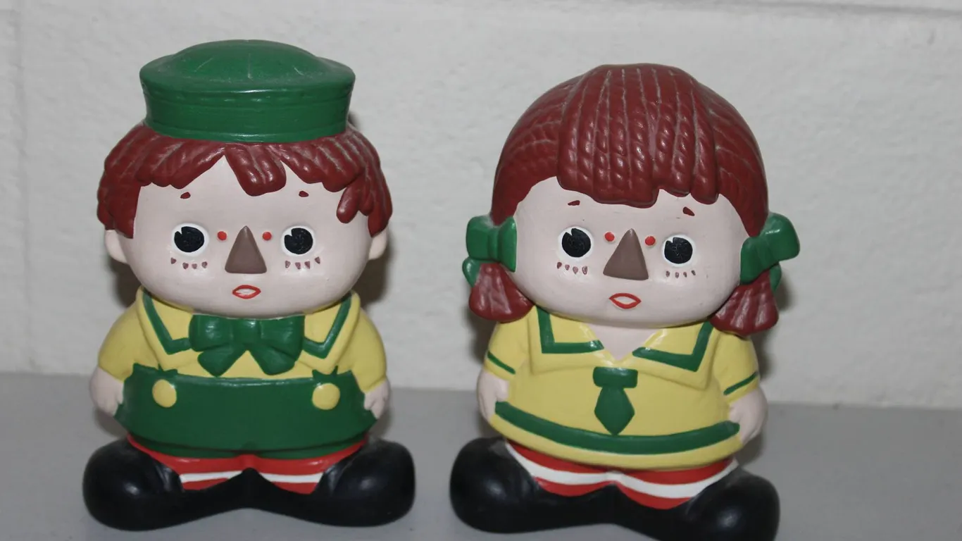 Boy and Girl Figural Coin Banks with Green and Yellow Attire, Resin Construction, Red Hair, Slot on