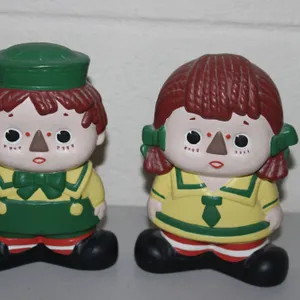 Boy and Girl Figural Coin Banks with Green and Yellow Attire, Resin Construction, Red Hair, Slot on