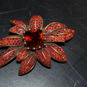 Judith Jack Signed Red Rhinestone Flower Brooch with Bronze-Tone Metal and Large Central Gemstone Ac