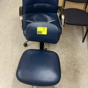 Assorted office chairs. Includes blue vinyl rolling task chairs with caster bases and a fabric stationary side chair with a black metal frame. Note: B