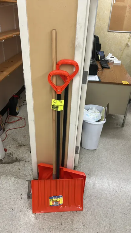 Bigfoot snow shovels. Includes (2) poly snow shovels with D-grip handles and (1) aluminum snow pusher with wood handle.