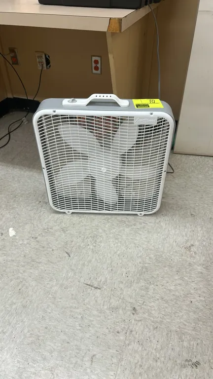 Aerospeed box fan. Features plastic housing, 5-blade design, top rotary speed control switch, and integrated top carry handle.