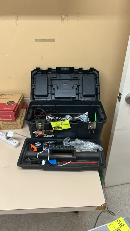 Poly tool box with removable tote tray and contents. Includes tape measure, partial drive socket set with organizer, power cord, and miscellaneous har