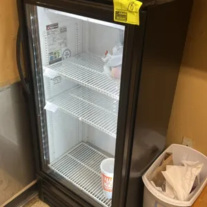 True GDM-10SSL-HC~TSL01 single-door glass merchandiser cooler. Features self-contained refrigeration, LED interior lighting, hinged glass door, black 