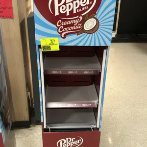 Cool Display Solutions CDS Cool Refer 115V US open-air refrigerated display merchandiser. Features Dr Pepper Creamy Coconut graphics, multi-tier shelv