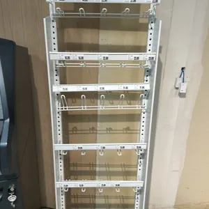 Two-sided metal mobile display merchandiser. Features multi-tier adjustable wire hook racks with integrated price tag channels, "Mobile Solutions" hea