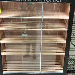 Wooden multi-tier cigar display merchandiser. Features sliding glass doors, slatted display shelving, 'PREMIUM CIGARS' header, and a 2-door lower stor