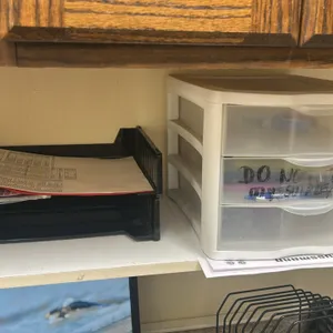 Assorted office supplies lot. Includes stacking plastic letter trays, clipboards, 3-drawer desktop organizer, wire file sorter, clear acrylic organize