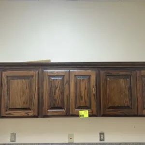 8' kitchen cabinet and countertop suite. Includes 8'L laminate countertop with single-basin stainless steel drop-in sink and faucet, 8'L upper wall ca
