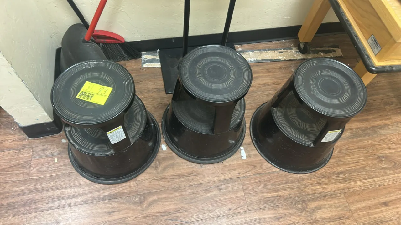 Vestil rolling step stools. Features 2-tier design, textured non-slip step surfaces, spring-loaded retractable casters, and wrap-around bottom bumper