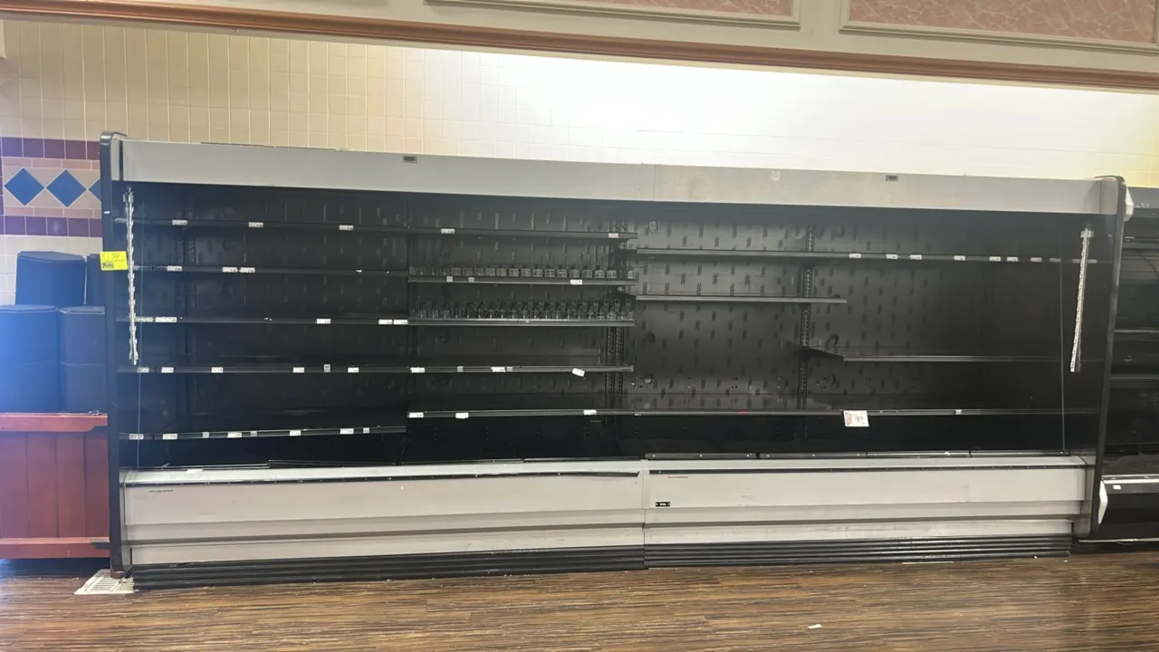 2012 Hillphoenix O5DM8 multi-tier medium-temp open display cases. Features solid adjustable metal shelving, price tag moldings, bottom wire racks, and