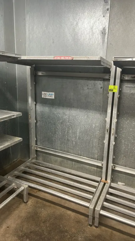 Aluminum cantilever racks. Features all-aluminum tubular construction, slatted bottom dunnage base shelf, top cantilever shelf, and multi-position adj