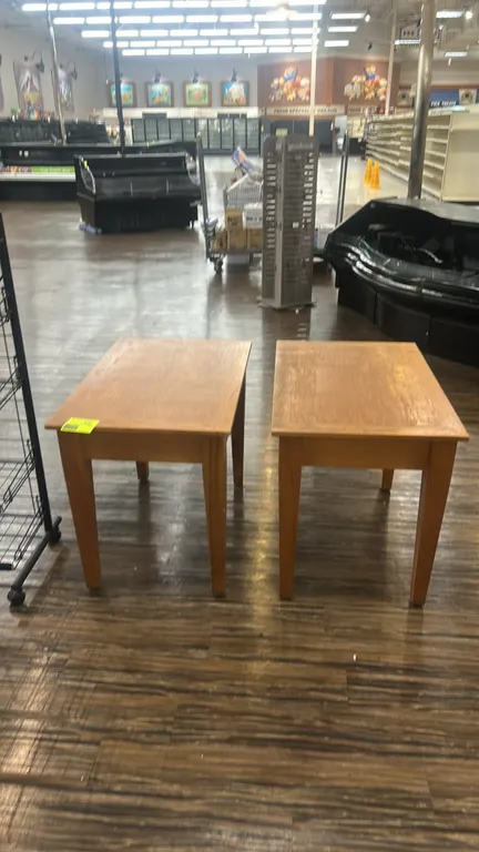 Wooden tables. Features light wood finish and tapered legs. Dimensions: 3'L x 2'W each.