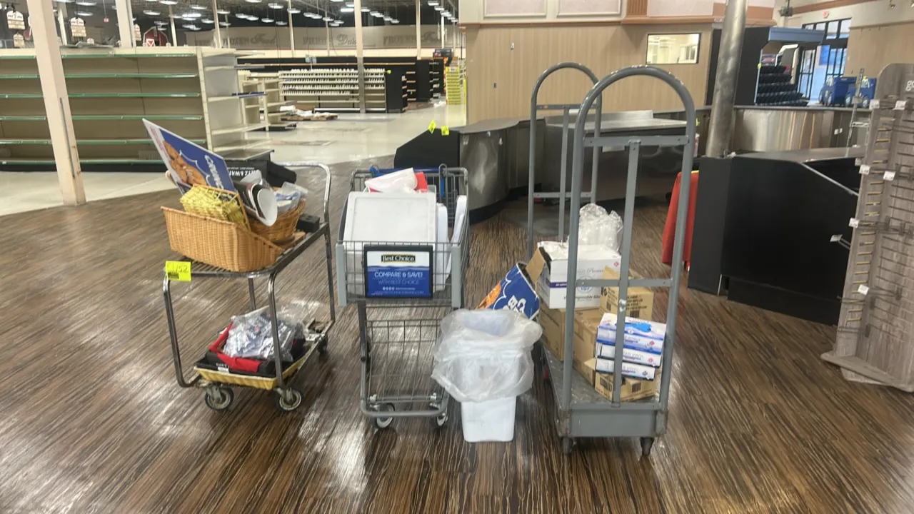 Assorted utility and stock carts. Includes a 3'L metal 2-tier cart, a metal wire shopping cart, and a 5'L metal U-boat platform cart with diamond plat