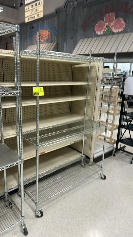 3-tier portable wire shelving rack. Features chrome wire construction with 3 wire shelves. 48" x 18". Mounted on casters.