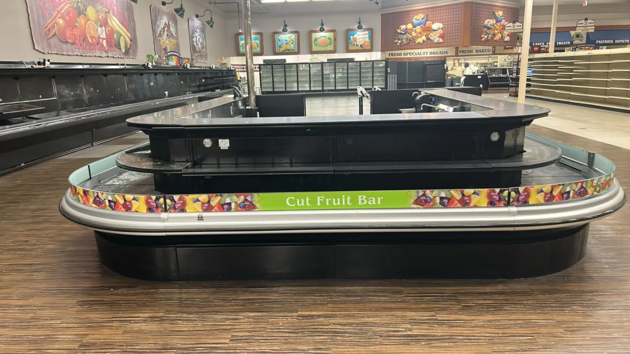 2011 Southern CaseArts ODC-2-12' 2-tier refrigerated open-air display cases. Features solid shelving, graphic front panel, and wrap-around island conf