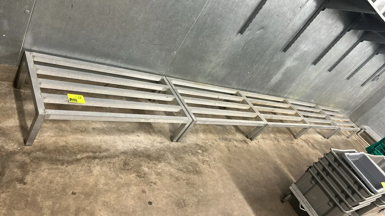 Metal dunnage racks. Features welded tubular metal construction with slatted top surface. 4'L each.