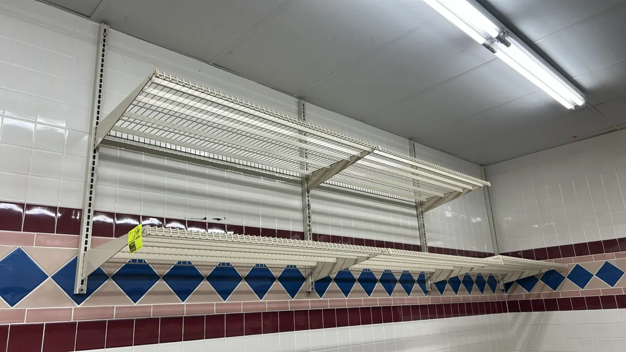 12'L of metal wire wall shelving. Features wall-mount slotted standards, support brackets, and coated wire shelves. Note: Sold by the foot.