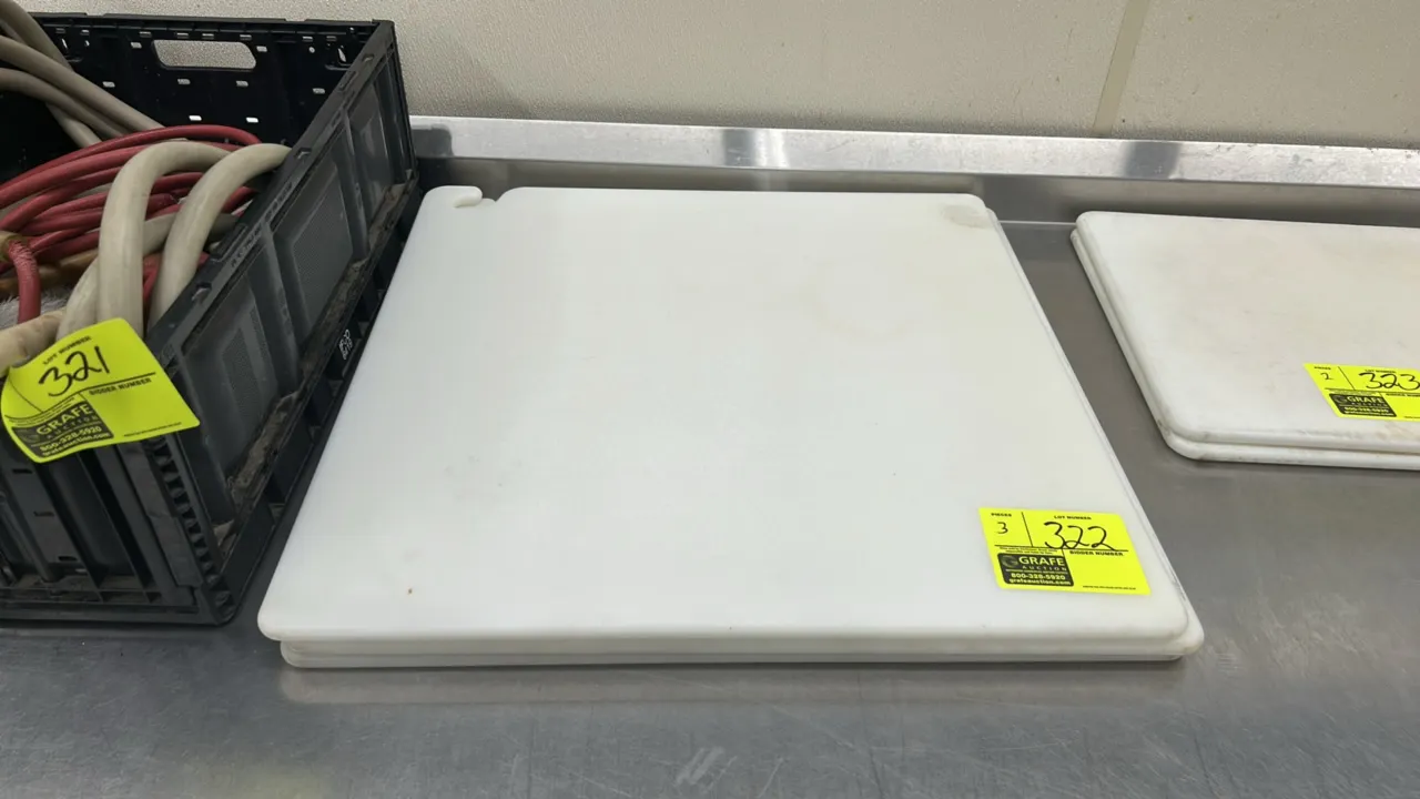 Poly cutting boards. Features white polyethylene construction with corner hanging hook cutout. 2'L.