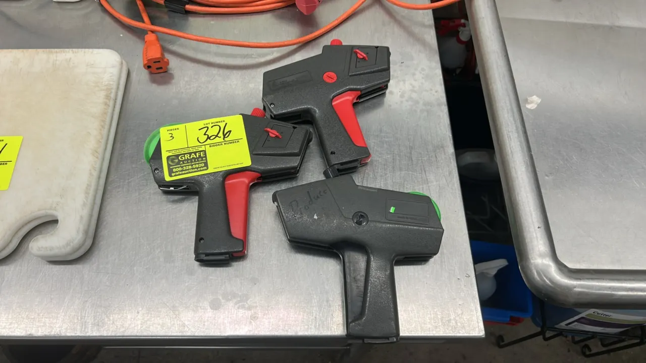 Monarch price tag guns. Features handheld manual squeeze-trigger operation and molded plastic housing.