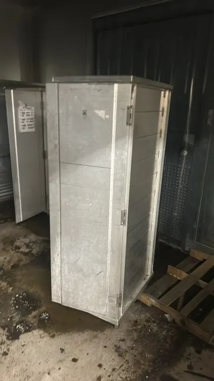 Aluminum transport cabinets. Features aluminum construction, single hinged solid door, and interior pan slides.