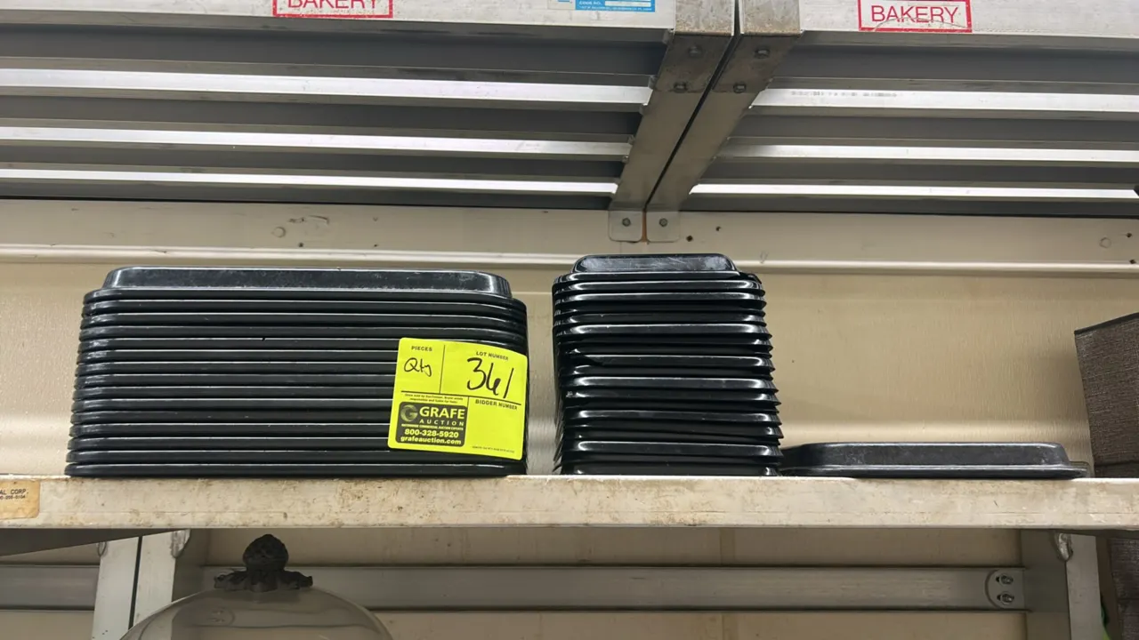 Assortment of full-size and half-size poly display trays. Features black molded plastic construction. Includes full-size and half-size trays. Shelving