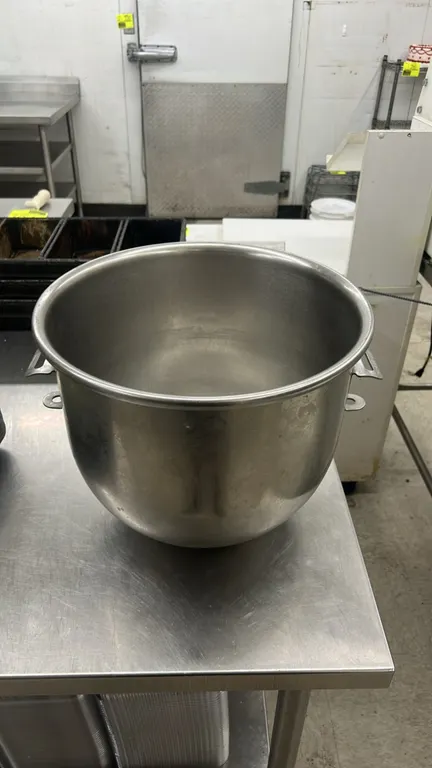 Stainless steel commercial mixer bowl. Features dual side lift/mounting handles and a rear guide pin. 14" Dia.