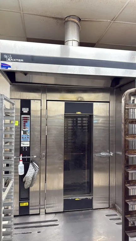 1999 Baxter OV210G-M2B Advantage natural gas rotating roll-in rack oven. Features stainless steel construction, digital programmable control panel, to