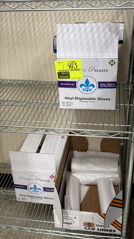 Assorted disposable vinyl gloves and can liners. Includes Royalty Premier powder-free vinyl disposable gloves in medium and large sizes, along with Tr