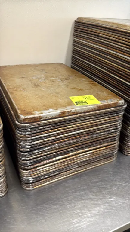 Full-size baking sheet pans. Features aluminum construction with wire-reinforced rolled rims. Stackable design. 18" x 26".