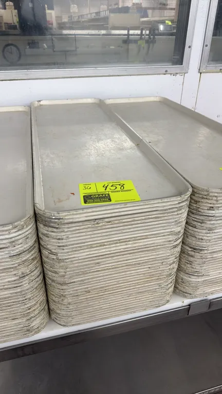 Poly meat display platters. Molded plastic construction with raised edges. Dimensions: 10.5" x 30".