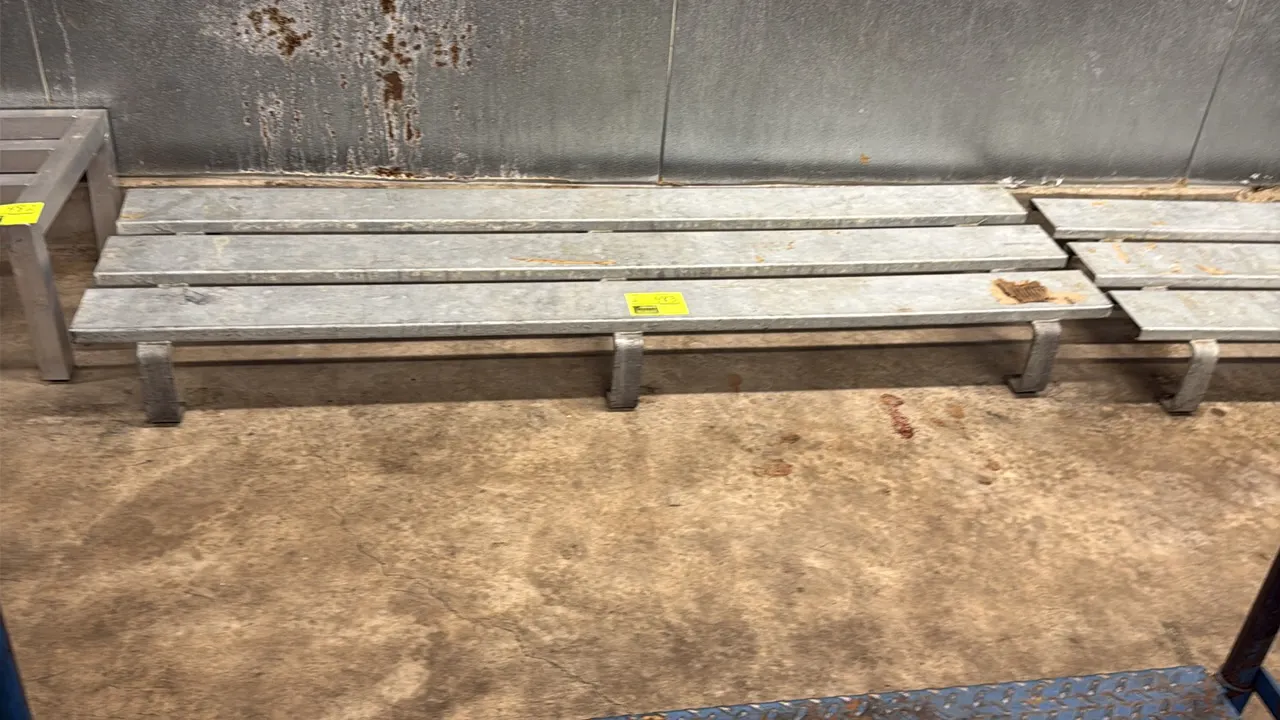 Galvanized metal dunnage racks. Features 3-slat top design and fixed low-profile leg supports. 6'L each.
