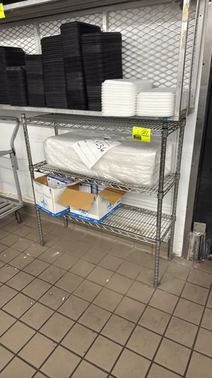 Metro-style wire shelving rack. Features 3 adjustable wire shelves with chrome finish. 42"L. Contents not included.